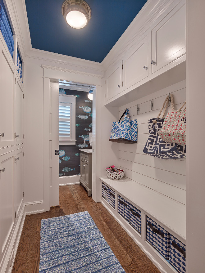 Mudroom Hallway with Cabinets on both walls. This small hallway-style mudroom feature cabinets on both walls. Mudroom Hallway style with Cabinets on both sides of wall. #MudroomHallway #MudroomHallwayCabinet #MudroomCabinets #MudroomWallCabinet Cole and Son 97/10032 Fornasetti II Acquario. Asher Associates Architects. Megan Gorelick Interiors