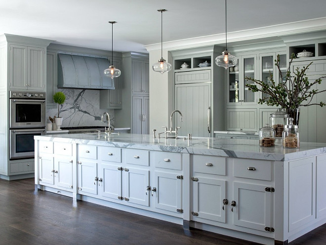 Gray kitchen with white island paint color. The island paint color is Benjamin Simply White and the gray cabinets were a custom color for the job. #Benjaminmooresimplywhite #whiteislandpaintcolors Johnston Home LLC