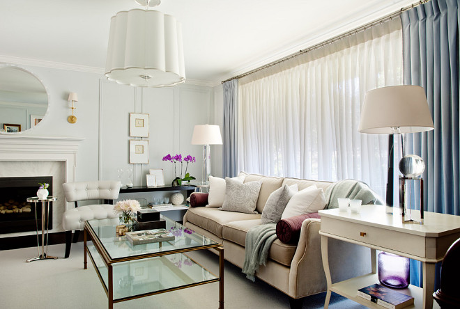 Chic, tailored living room. Custom upholstery with Barbara Barry fabric on accent toss cushions. Large scale lighting fixtures. #Livingroom Elizabeth Metcalfe Interiors & Design Inc.
