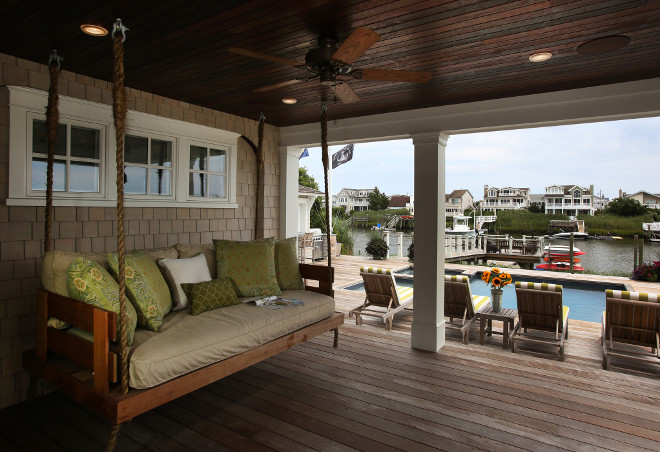 Coastal home with porch swing. Porch swing #Porchswing Asher Associates Architects