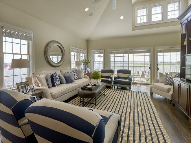 Living room with striped fabric and rug. Megan Gorelick Interiors