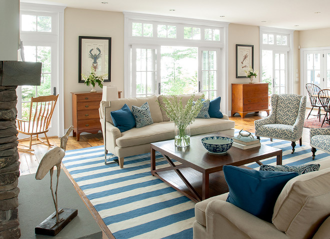 Neutral living room with blue and white decor. Banks Design Associates