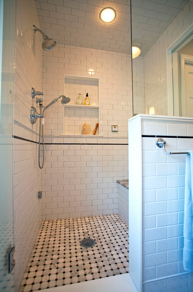 Shower. Bathroom Shower. Shower has a built-in bench, niche, and secondary hand-held shower. #Shower #ShowerBench #ShowerNiche #showerideas #ShowerReno TreHus Architects+Interior Designers+Builders