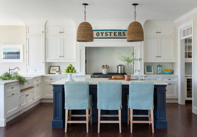 Navy island. White kitchen with navy island and blue and white decor. White kitchen with navy island and Carrara marble countertop. #NavyIsland #Whitekitchen #WhitekitchenNavyisland #Carraramarble #Coastalkitchen #beachhousekitchen Kate Jackson Design