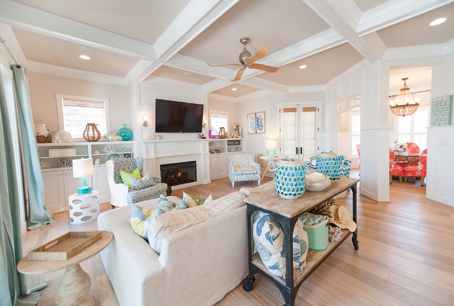 Family Room with coffered ceiling and light wide plank floors. Sconces over the fireplace are Circa Lighting Boston Head Light Sconce Family Room coffered ceiling. Family Room light wide plank floors. #FamilyRoom #FamilyRoomcofferedceiling #FamilyRoomlightwideplankfloors #cofferedceiling #lightwideplankfloors #wideplankfloors