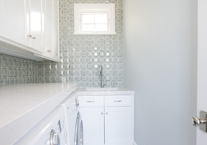 Small Laundry Room. A geometric backsplash tile and white quartz countertop adds interest to this small laundry room. #SmallLaundryroom #Laundryroom #Smallspaces #smallinteriors