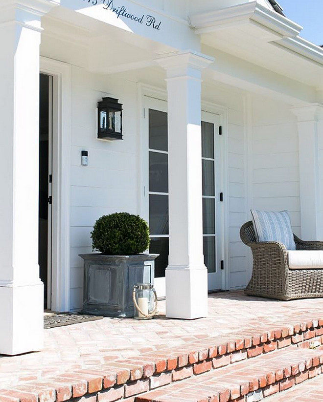 Brick Porch. White home exterior with brick porch. Vintage brick porch. #brick #Porch #brichporch #porchideas Brooke Wagner Design