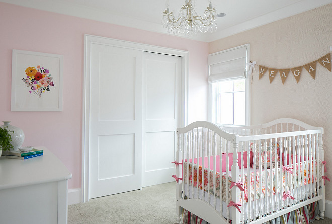 Nursery Ideas. Girls Nursery. Girls Nursery Painted in Pink and with wallpaper accent wall. #GirlsNursery