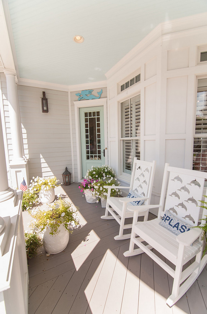 Porch. Front Porch Chairs and Decor. Front Porch with blue ceiling and turquoise front door. Porch ceiling paint color is Glidden Warm Breeze. Front Porch. #FrontPorch Strickland Homes