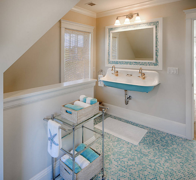 Small Bathroom Ideas. Small Bathroom Reno. Small Bathroom with turquoise penny round floor tile and double Kohler Brockway Sink. #KohlerBrockwaySink #SmallBathroom #Smallbathroomreno #pennyroundfloortile