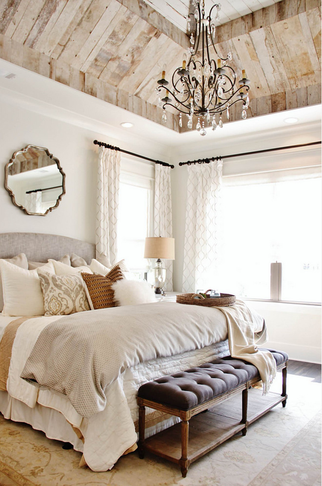 Reclaimed wood ceiling in bedroom. Wall paint color is Greek Villa from Sherwin Williams. Bedroom reclaimed wood on ceiling is reclaimed barnwood. Bedroom reclaimed wood ceiling. #GreekVillaSherwinWilliams #Bedroom #reclaimedwoodceiling #reclaimedbarnwood Landmark Homes of Tennessee