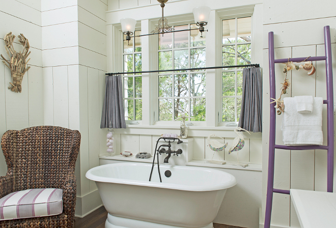 Bathroom. Isn't this a great bathroom? I love the purple ladder! Tub- Cheviot Faucet and tub filler- Cifial Chair – Pier 1 with custom cushion Ladder – Serena and Lily Light – Custom – Eloise Pickard #bathroom Interiors by Courtney Dickey and T.S. Adams Studio.