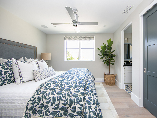 Guest Bedroom. On the second level you'll find a guest bedroom with en-suite bath. Wall color is Dunn Edwards DEC 774 Shady. Guest bedroom color palette. #GuestBedroom #colorpalette Patterson Custom Homes