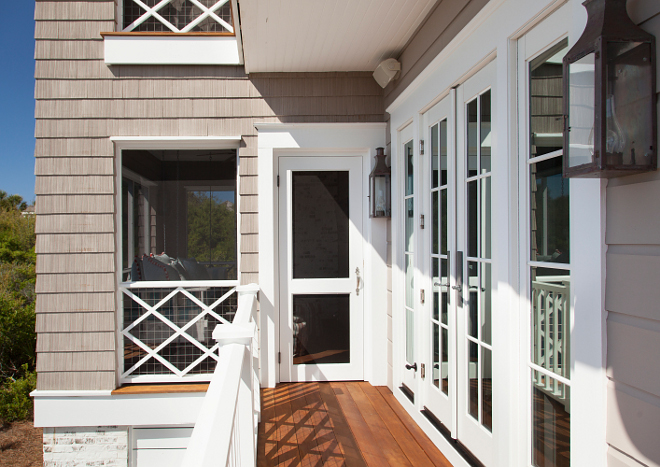 Shingle Home Balcony railing. This balcony with Ipe deck boards lead you directly to a screened-in porch. Shingle Home Balcony railing ideas. Shingle Home Balcony railing. Shingle Home Balcony custom railing. #ShingleHome #Balconyrailing T.S. Adams Studio, Architects