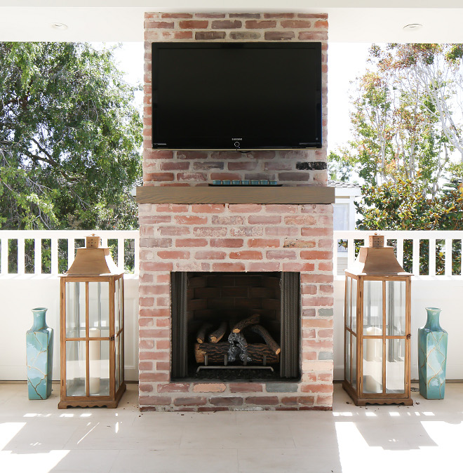 Outdoor TV. Outdoor TV. TV mounted on an outdoor fireplace. Outdoor TV #Outdoor #TV Patterson Custom Homes. Interiors by Trish Steele, Churchill Design.