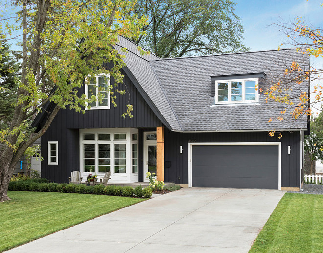 Dark home exterior paint color ideas. Black exteriors. Dark gray exterior. Charcoal exterior paint color. The exterior color is Benjamin Moore Black Jack 2133-20. The garage door and dark trim is Benjamin Moore French Beret 1610. The white trim is Benjamin Moore Decorator's White. Charlie & Co. Design, Ltd.