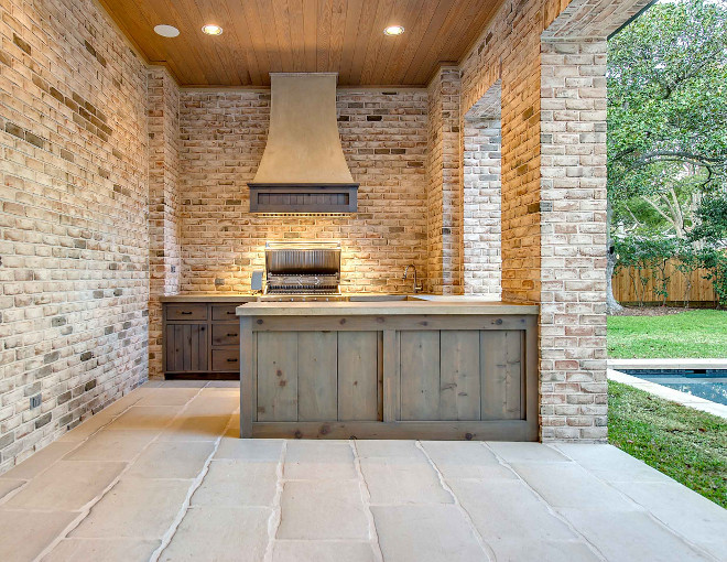 Outdoor kitchen cabinet. Outdoor kitchen with reclaimed wood cabinet. Reclaimed wood cabinets for outdoor kitchens. #reclaimedwoodcabinet #outdoorkitchencabinet #outdoorkitchen Elizabeth Garrett Interiors.