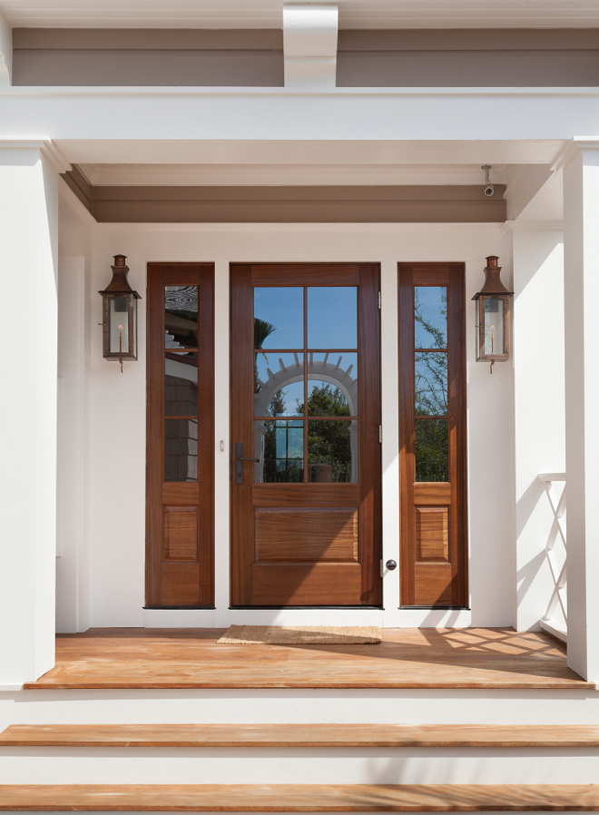 Wooden front door and sidelights. This home features beautiful wooden front door and sidelights. Wooden front door and sidelights. Natural Wood front door and sidelights #Woodenfrontdoor #woodfrontdoor #wooddoor #woodsidelights #frontdoor #woodsidelight T.S. Adams Studio, Architects