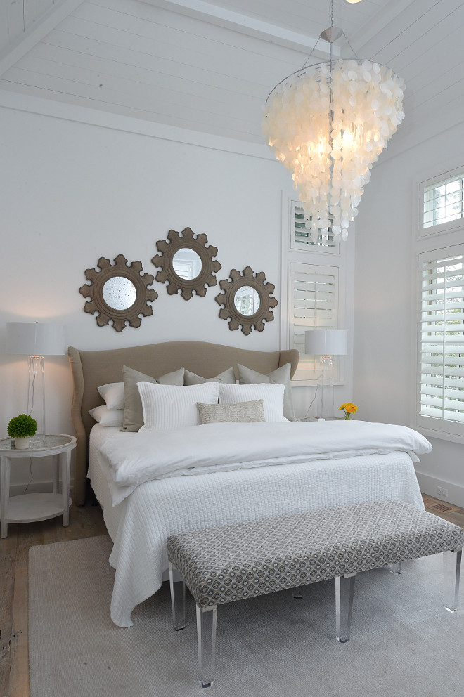 Mirror above bed. Mirrors above bed idea. Mirror above bed. 3 mirrors above bed are Aidan Gray. #Mirrorabovebed #mirrorsabovebed #mirrorbed #mirrors #bed #bedroomMirror Interiors by Courtney Dickey of TS Adams Studio.