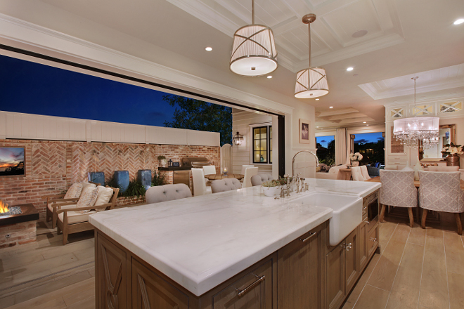 Large kitchen island. This kitchen is perfect for cooking and entertaining. #kitchenisland #kitchen Patterson Custom Homes. Interiors by Trish Steele, Churchill Design.