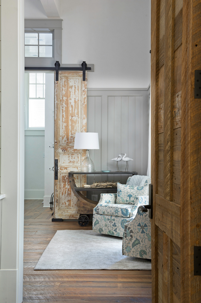 Bedroom Reclaimed Doors and Hardware. The master bedroom features antique doors hung with barn door hardware and a wooden reclaimed door. Reclaimed doors – Charles Phillips Antiques, hardware – Ashley Norton #Reclaimedwooddoors #AntiqueDoor #Hungantiquedoor #Antiquedoor #Barndoorharware 