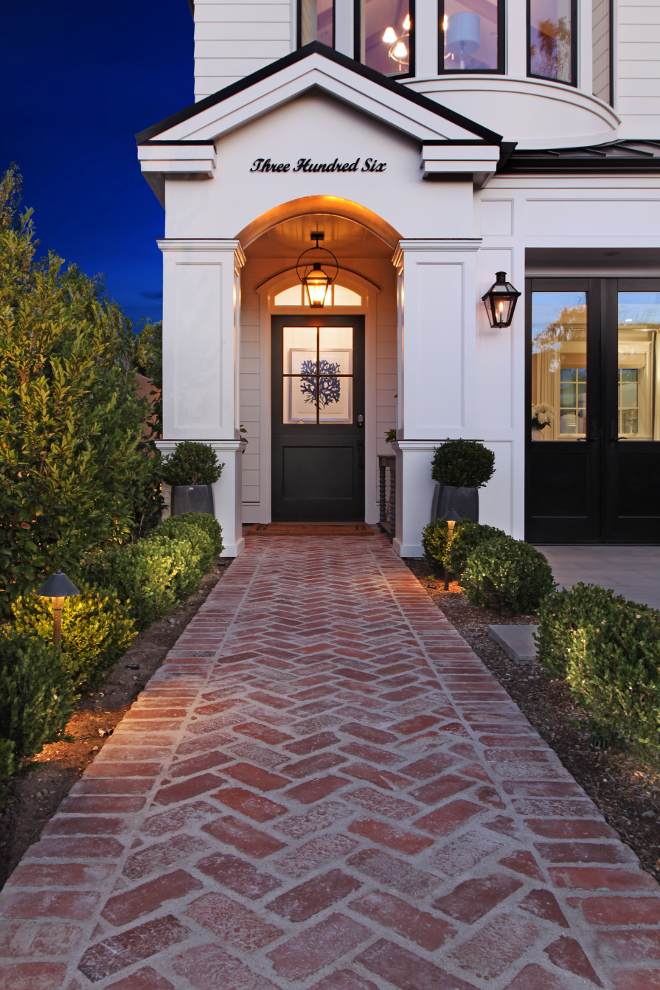 A brick pathway leads you to the front door. Patterson Custom Homes. Interiors by Trish Steele, Churchill Design.