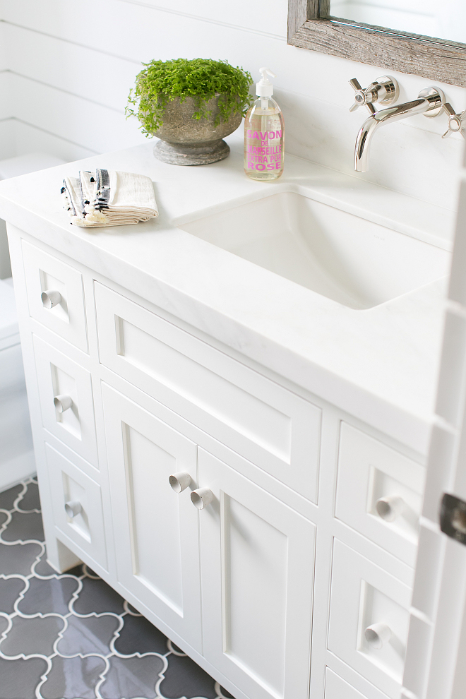 The bathroom countertop is pacific white marble slab. The bathroom countertop is pacific white marble slab. #bathroom #countertop #pacificwhite #marbleslab Patterson Custom Homes