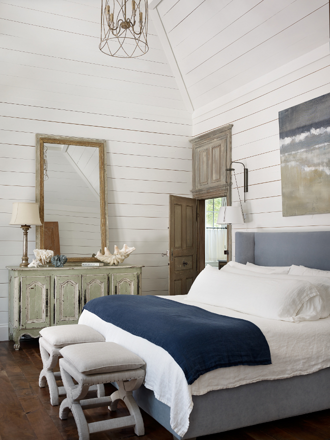 Shiplap bathroom paint color and decor. Shiplap wall and trim paint color is Pratt and Lambert Seed Pearl. The master bedroom features a beautiful Mitchell Gold upholstered bed in velvet. Lighting is from Urban Electric Co. #shiplap #Bedroom #Bedroompaintcolor #Bedroomdecor #Bed Interiors by Courtney Dickey of TS Adams Studio