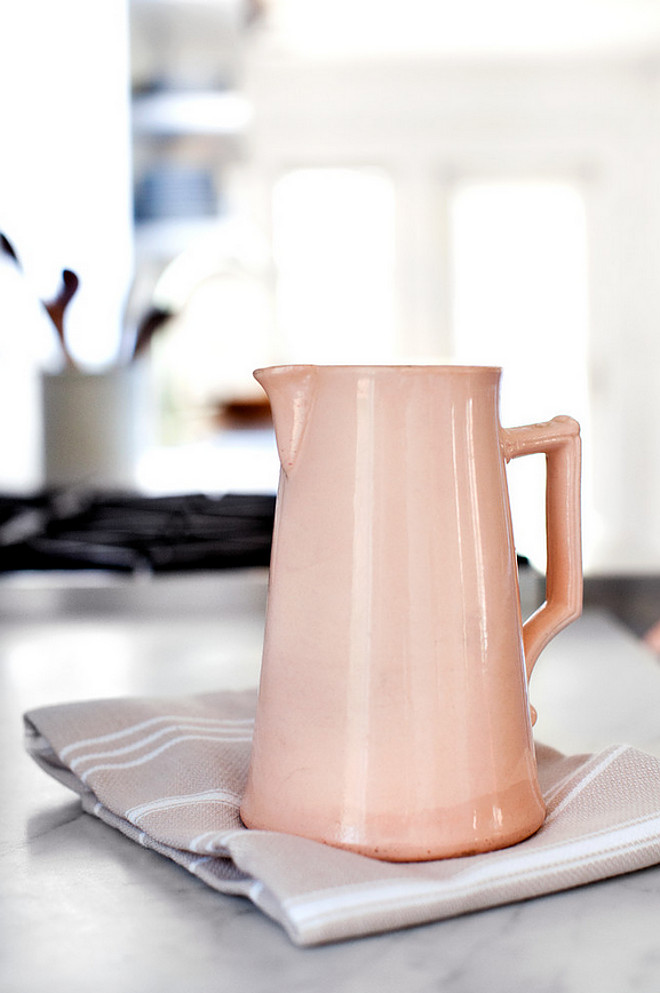 Ceramic pitcher. Kitchen accessories. A few kitchen accessories bring color to this two-toned kitchen. #kitchen #accessories #pitcher Elizabeth Lawson Design