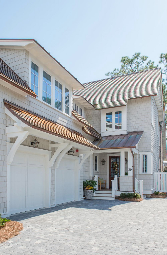 Benjamin Moore OC-117 Simply White. Exterior trim and garage doors paint color is Benjamin Moore OC-117 Simply White. Benjamin Moore OC-117 Simply White exterior. #BenjaminMooreOC117SimplyWhite #BenjaminMooreOC117 #BenjaminMooreSimplyWhite #BenjaminMoore #OC117 #SimplyWhite Interiors by Courtney Dickey of TS Adams Studio.