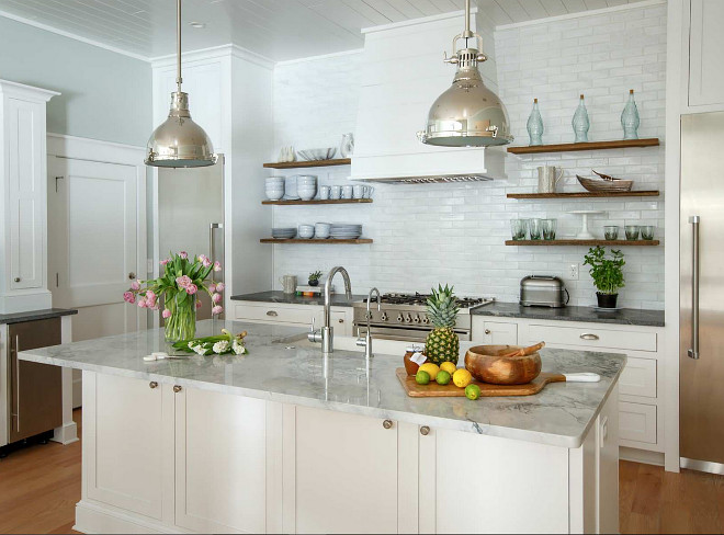 Kitchen Bertazzoni bluestone bungalow coastal style farm sink herringbone pattern kitchen remodel Kohler marble countertops painted brick reclaimed beams reclaimed shelves shaker style shiplap soapstone countertops Thermador vaulted ceilings white oak Heritage Homes of Jacksonville