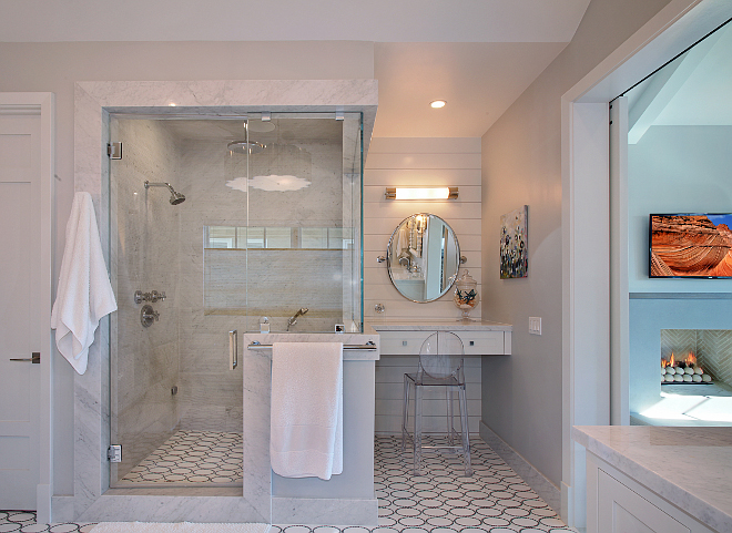 Master Bathroom Shower. The shower features steam shower and bamboo finish Carrera marble on shower walls. Patterson Custom Homes. Interiors by Trish Steele of Churchill Design. 