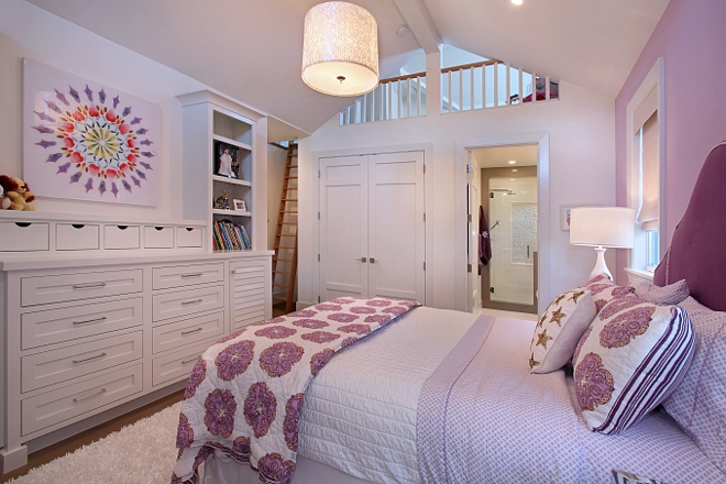 Teen bathroom with loft and custom built-in dresser. This bedroom features a hidden loft with access by a stained wood ladder. Patterson Custom Homes. Interiors by Trish Steele of Churchill Design. 