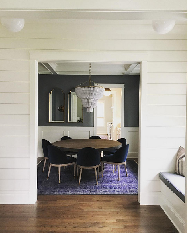 Wainscotting. Millwork. Shiplap hallway opens to dining room with wainscotting. #wainscotting #millwork #shiplap #wainscotingwalls Kate Marker Interiors.