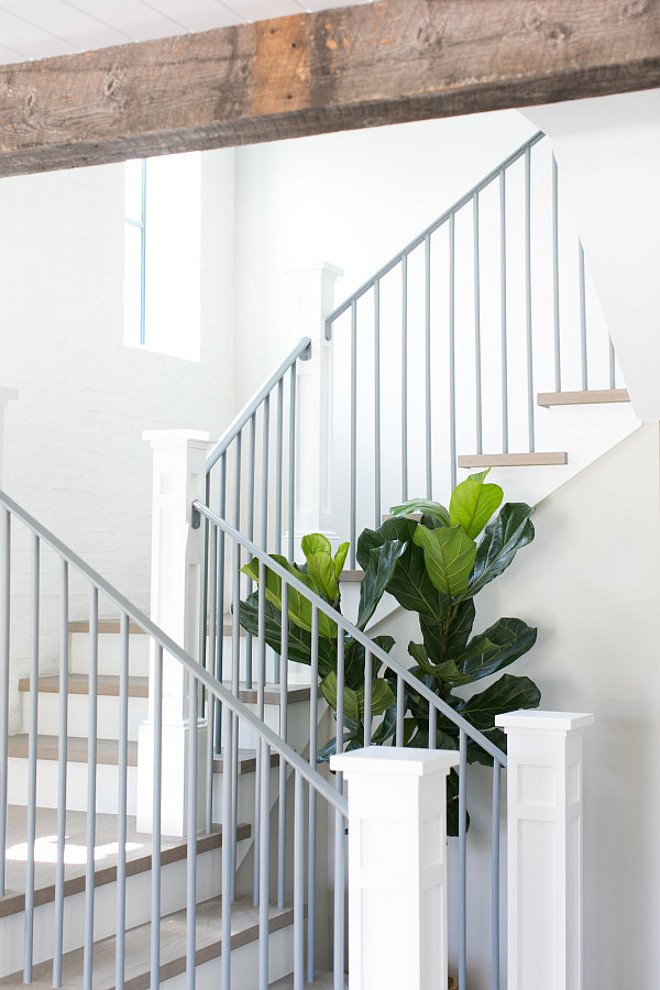 White newel post paint color. Trims and the craftsman style newel posts are painted in "Dunn Edwards 2005 Evershield Semi-gloss". #newelpost #trim #staircase #paintcolor #DunnEdwards2005Evershield