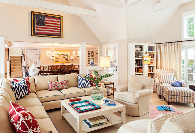 After selling a large, family home in suburban Boston, and moving into an apartment the city, our clients decided to renovate their summer home on Cape Cod. Caroline collaborated with Robin Violandi on the project and the pair created spaces that feature a neutral palette interspersed with pops of color such as the nautical navy and red accents in the living room and a rich, blue hue on the base of the island in the kitchen. The wall color in the family room is BM Manchester Tan and the walls in dining room are covered in grasscloth by Ralph Lauren.Welch Company Home + Design