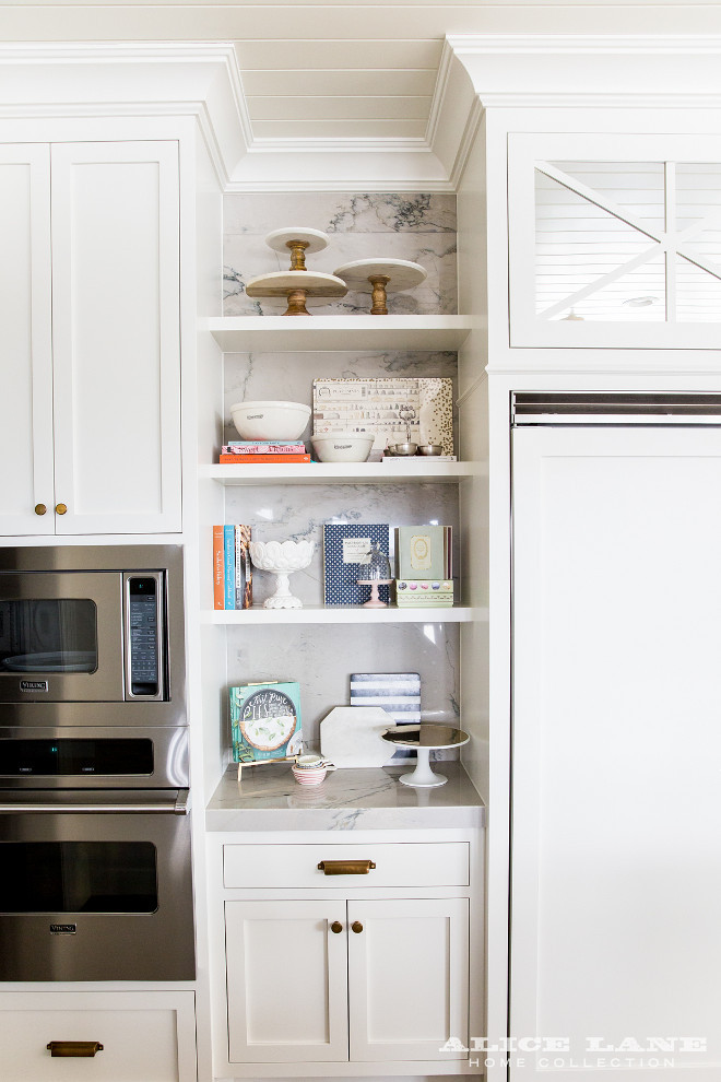 Kitchen open shelves flanked by cabinets. A new way to have open shelves in kitchen is by adding the open shelves between cabinets. #kitchen #openshelves #Shelvesbetweencabinets #shelves #cabinets Alice Lane Home