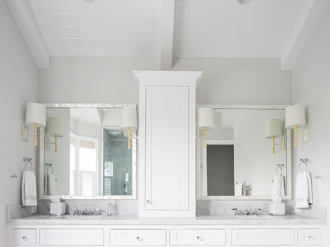 White and grey bathroom. White shaker cabinets are Benjamin Moore Decorator's White. Grey wall paint color is Stonington Gray by Benjamin Moore #white #grey #bathroom #paintcolor #Benjaminmooredecoratorswhite #whitecabinet #greywalls #StoningtonGray #BenjaminMoore