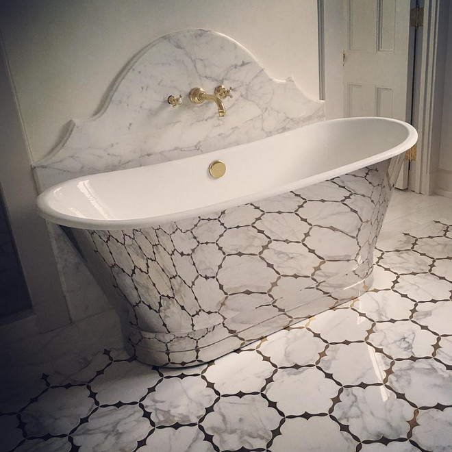 Bathroom Heated floors. Bathroom with heated brass inlayed Calcutta gold marble floors. Melanie Turner Interiors