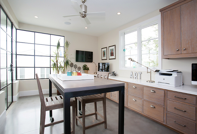 Craft Room. Craft Room Ideas. Craft Room with built-in cabinet to store art supplies and a custom large table. #Craftroom #Craft #Room Patterson Custom Homes