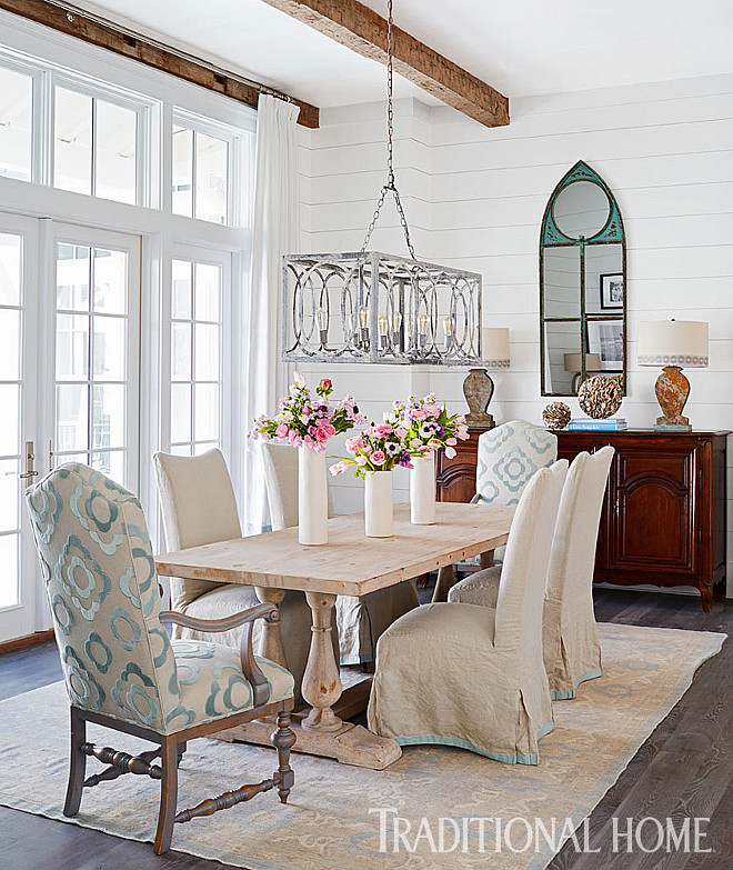 Dining Room. Shiplap dining room walls with reclaimed beams on ceiling. Chandelier is from Beau Home Interiors. #Diningroom #shiplap #walls #reclaimedbeams