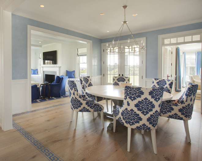 Dining room with Painted Greek key floors. beautiful blue and white dining room with Painted Greek key floors. #diningroom #PaintedFloors #Greekkeyfloors. Lynn Morgan Design.