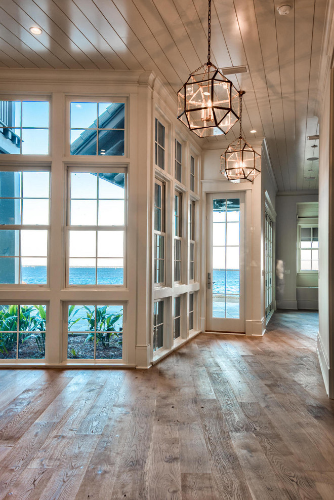 Hardwood Flooring. Windows and hardwood Floors. The front door opens to a foyer with reclaimed plank wood floors. The front door opens to a foyer with reclaimed plank wood floors. Floors are Nikzad engineered, French White Oak, lightly wire brushed & naturally oiled. #window #hardwood #floors #Flooring #HardwoodFlooring Casey Joiner