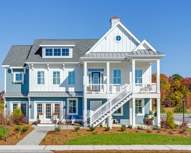 Home Exterior. Blue and white home exterior. Home exterior features blue siding and white board and batten exterior. #Blueexterior #blueandwhiteexterior #siding #boardandbatten Schell Brothers