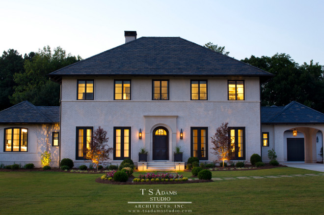 Home Exterior. Home exterior. Classical exterior ideas. Eliptical arch. Exterior lighting. Hipped roof. Exterior painted brick. Portico. Slate roof. stepping stones. Traditional exterior. White exterior #home #exteriors TS Adams Studio Architects. Traci Rhoads Interiors.