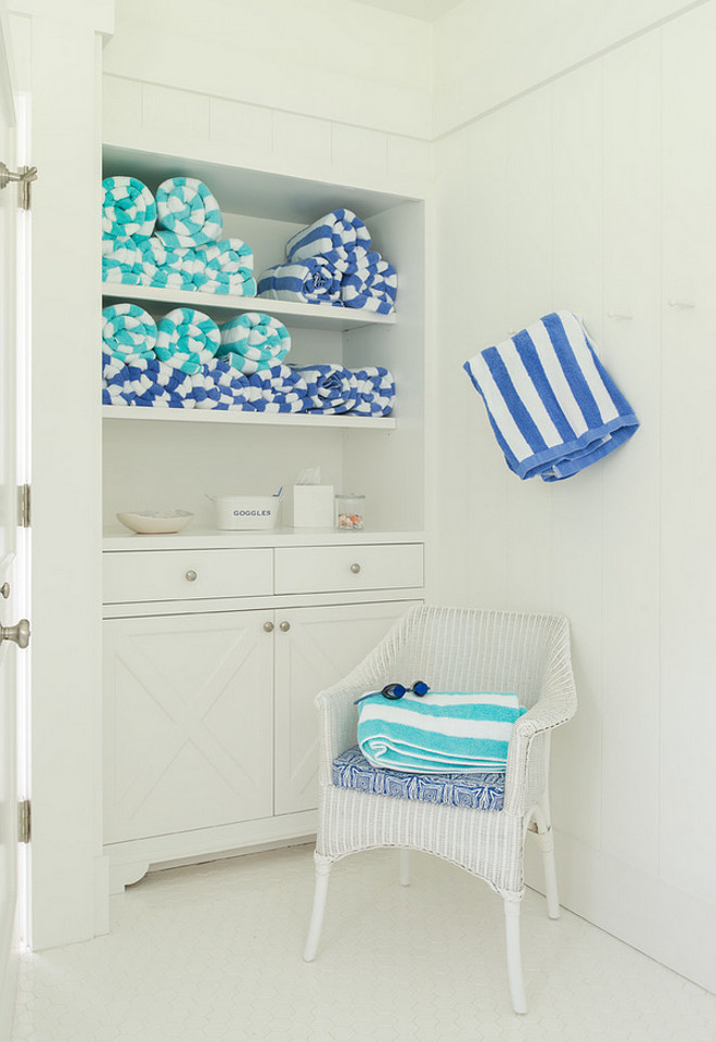 Pool house built-in cabinet to store towels for guests. Brooks and Falotico Associates, Inc.