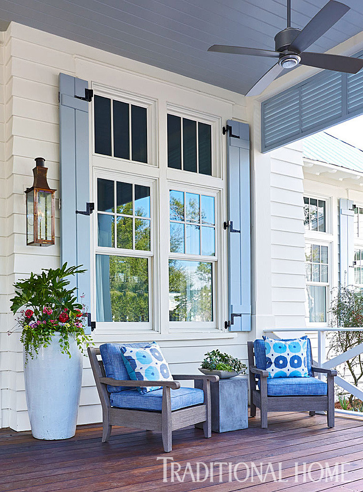 Porch siding, shutters paint color. Porch Lighting and Furniture. #Porch #Siding #Shutters #Paintcolor #PorchFurniture #Lighting Traditional Home - T.S. Adams Studio.