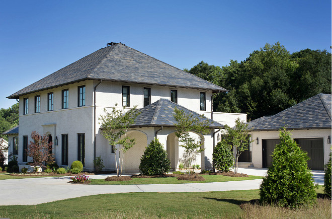 Side Garage. Home exterior with side garage and porte-cochère. #sidegarage #portecochère TS Adams Studio Architects. Traci Rhoads Interiors.