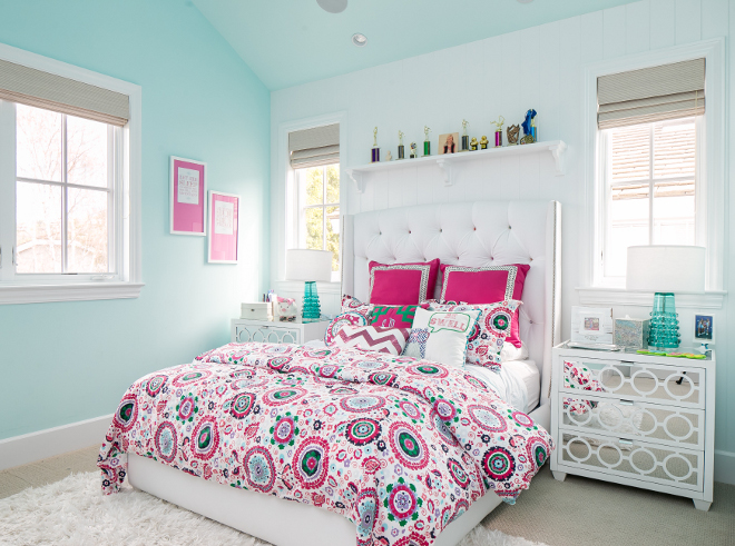 Turquoise and pink bedroom. This bedroom is too darling, isn't it?! The upholstered bed is custom. Bedding is by Eastern Accents. Rug by Feizy. Nightstands are from Worlds Away. Churchill Design.