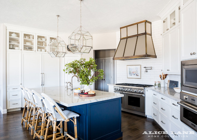 White Kitchen with Navy Blue Island Reno. White Kitchen with Navy Blue Island Reno Ideas. See how to copy this look on the blog post. #WhiteKitchen #NavyBlueIsland #KitchenReno #RenoIdeas Alice Lane Home.
